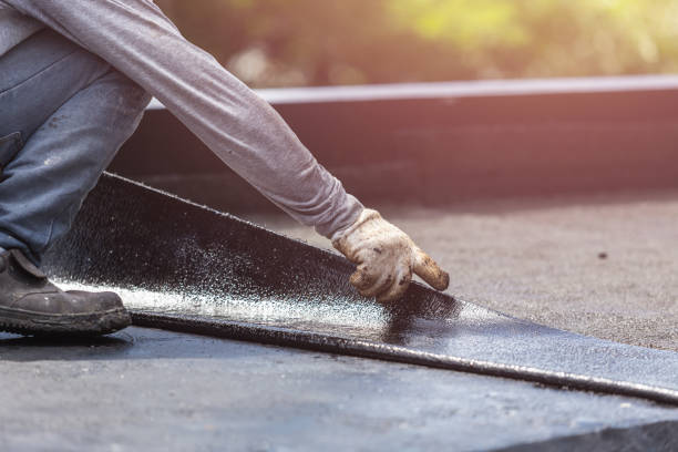Professional Waterproofing technician working in Yorktown, IN